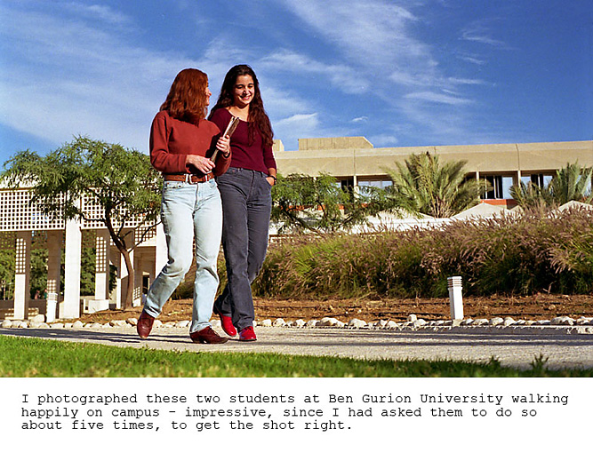 35_two students walk on campus_FS